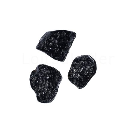 Tai tektiit lihvitud keskmine (~1,5*3 cm)