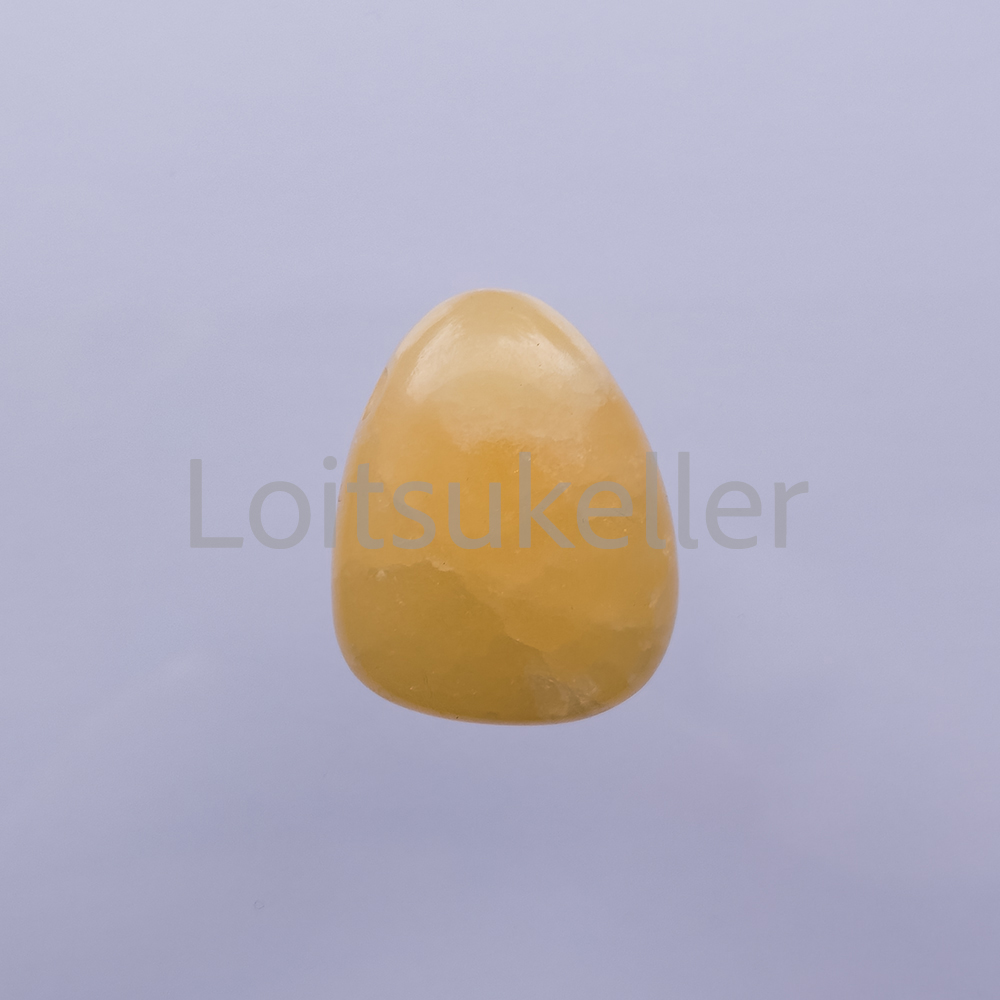 Kaltsiit kollane ripats (~2,2*2,8 cm)